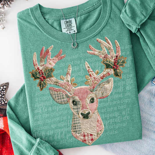 Deer with holly