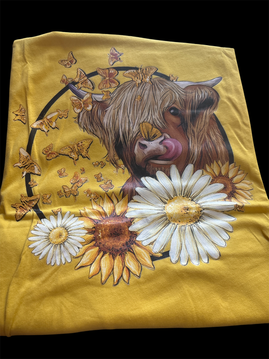 Highland cow with sunflowers and butterflies bella canvas mustard