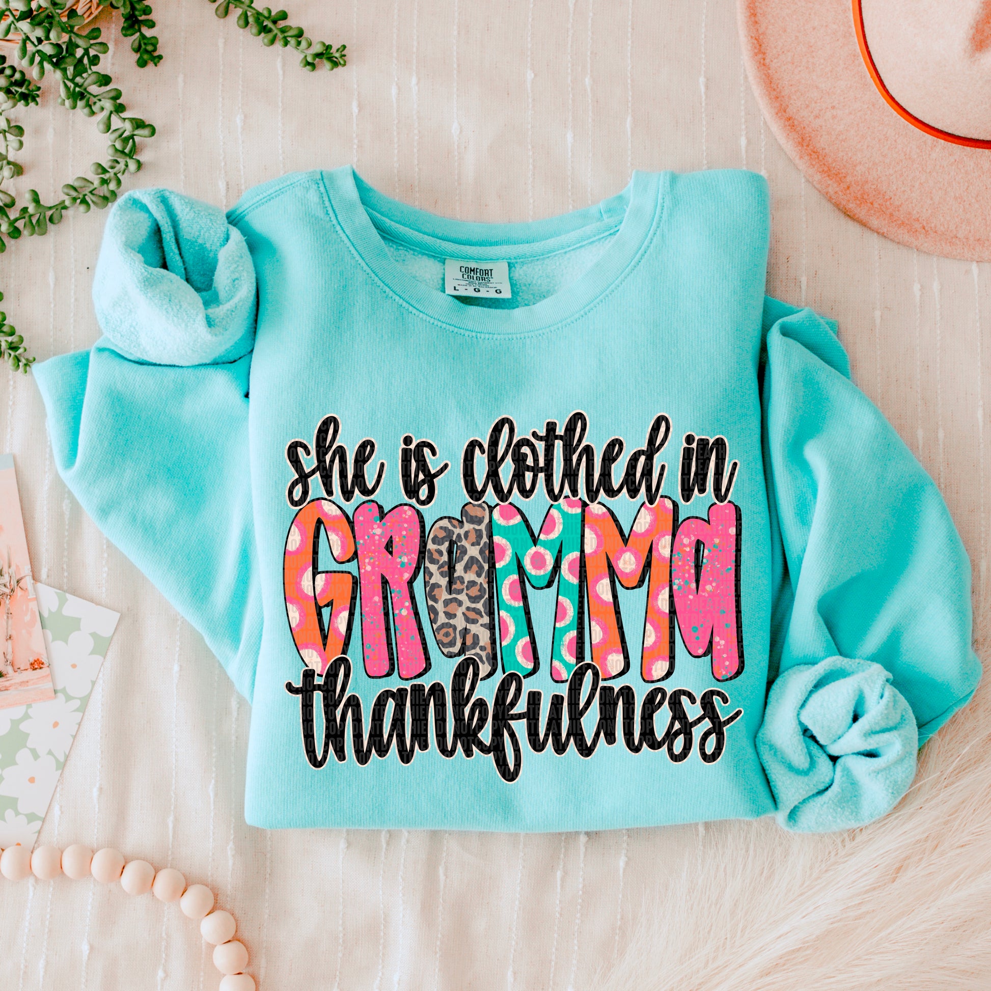 She is clothed in thankfulness (drop down menu names)