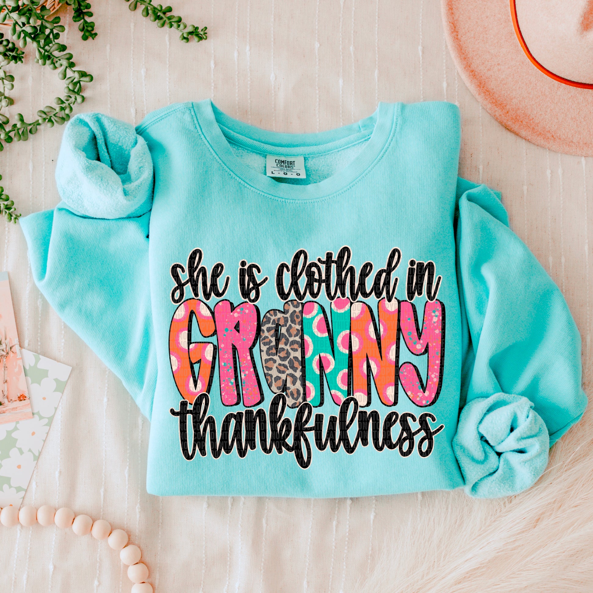 She is clothed in thankfulness (drop down menu names)